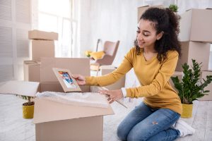 girl packing her belongings