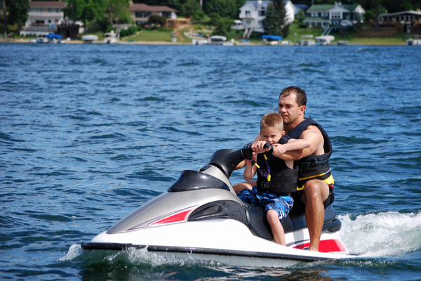 a pristine sea-doo on the water in the summer