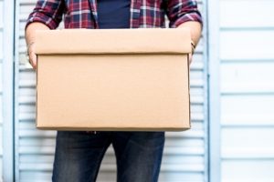 man holding a moving box