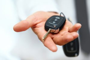 car owner with keys in hand