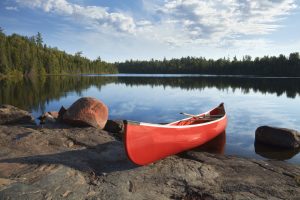 canoe on lake in canada