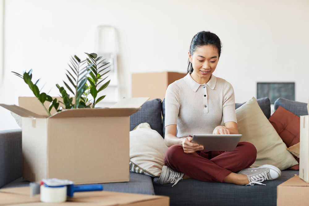 woman makes list for spring cleaning